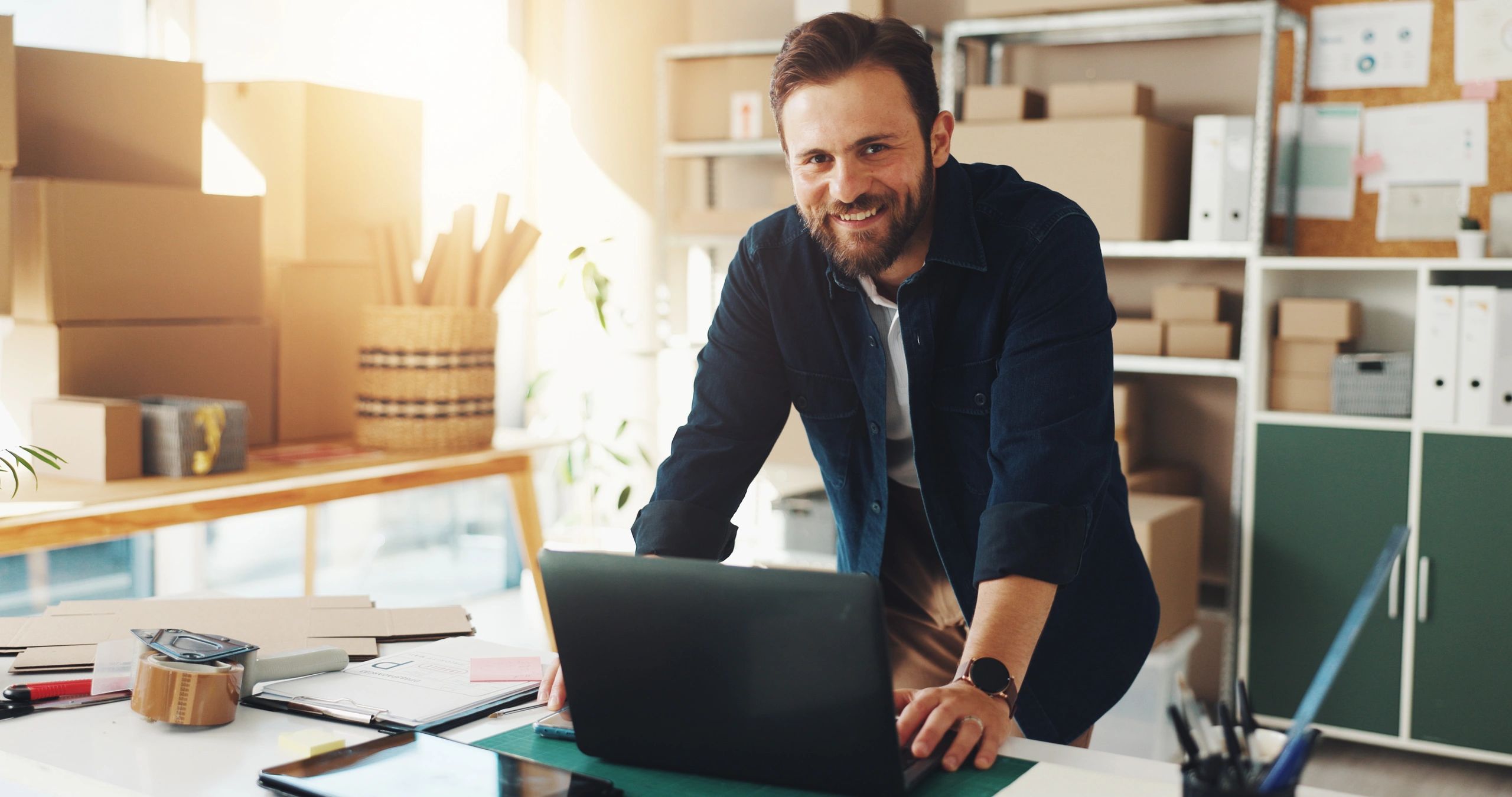 business owner working on laptop