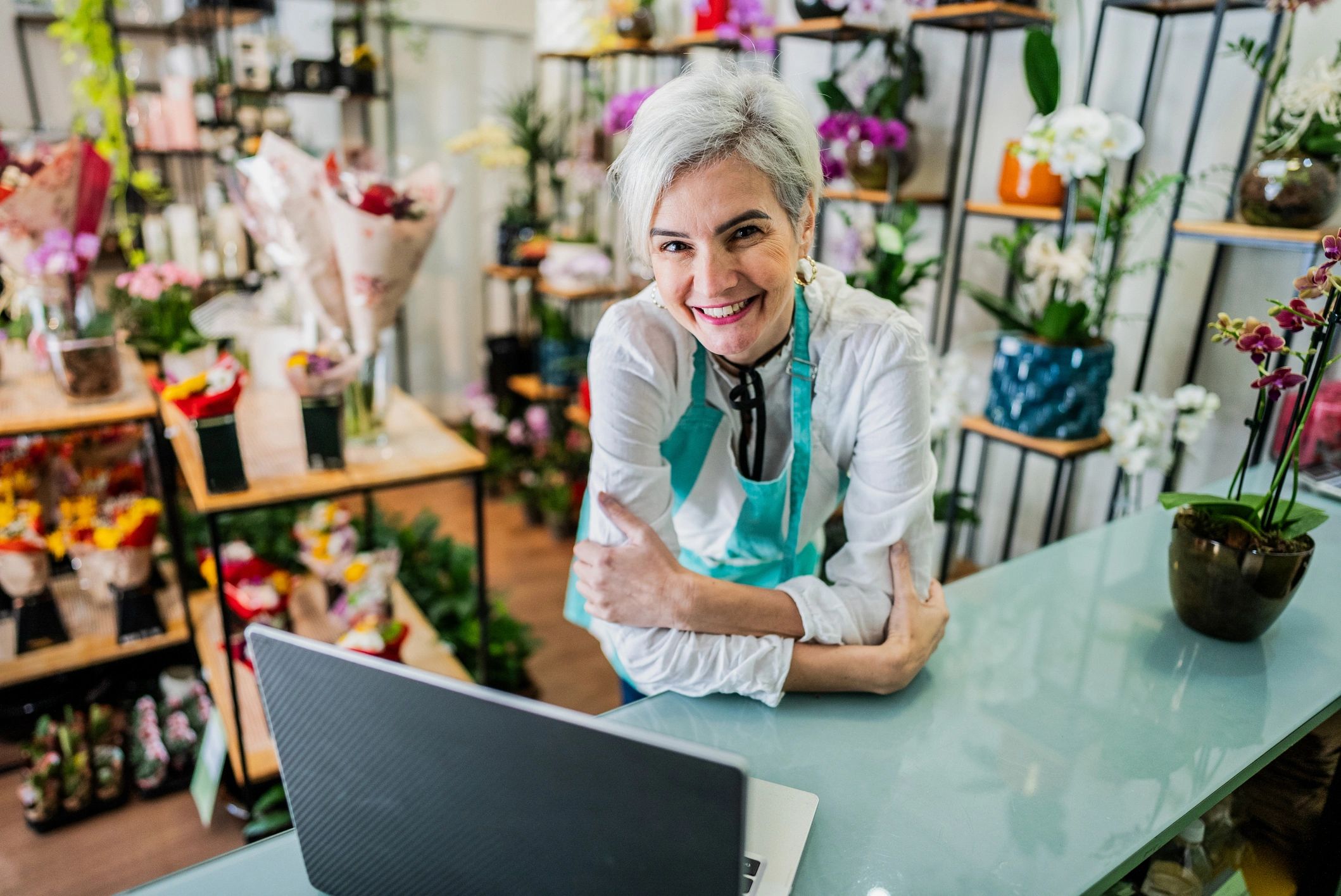 business owner working on laptop